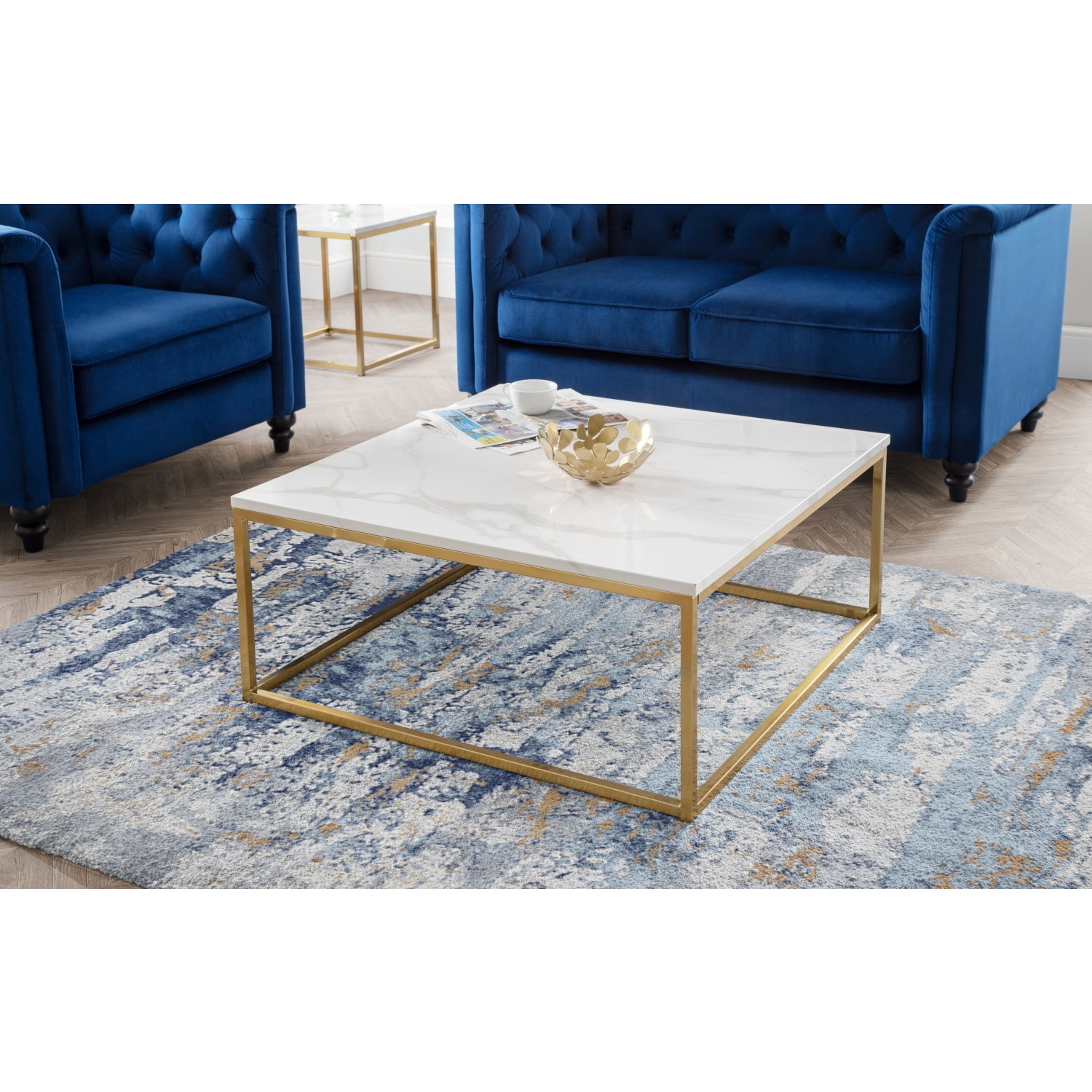 Read more about Small square marble coffee table with gold legs julian bowen